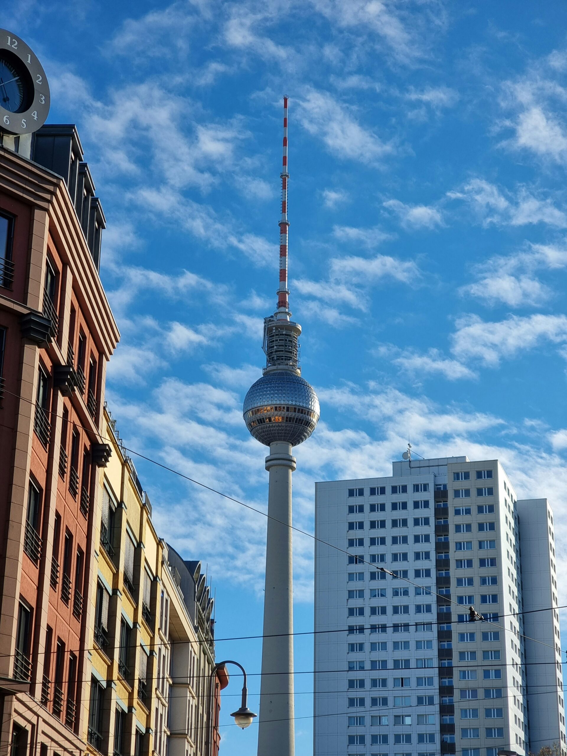 a very tall tower towering over a city